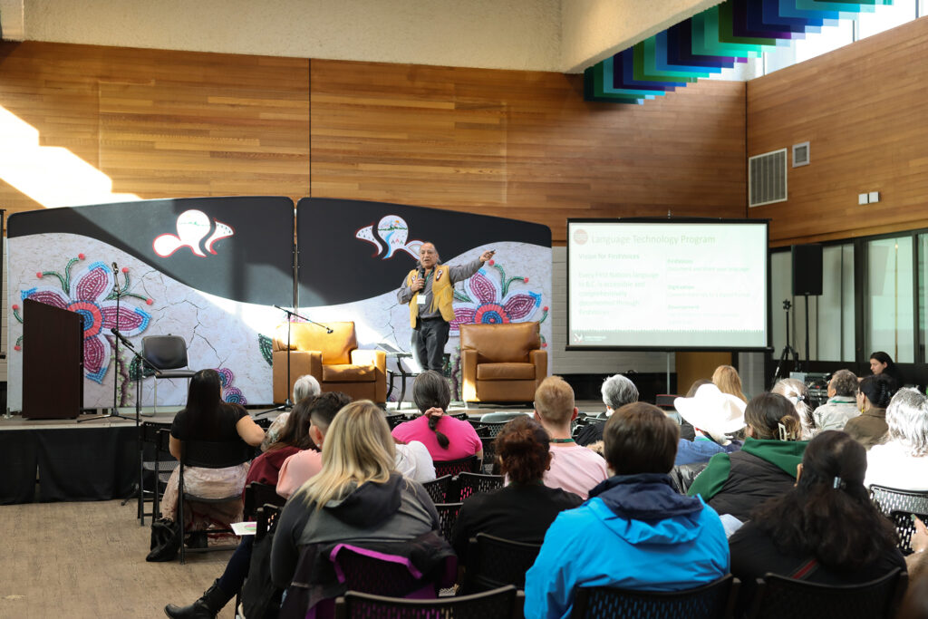 An Indigenous man speaks at the First Nations Language symposium.