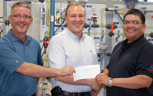 Trevor Loberg and Irvin Wai of Alliance Pipeline with Jeff Lekstrom (centre), Dean of Trades and Apprenticeship.