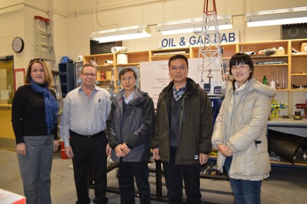 Jennifer Moore, PRRD economic development officer, Trades and Apprenticeships associate dean Robert McAleney, Wu Xiaojin, Li Guo Fang, and translator Sophia Sun