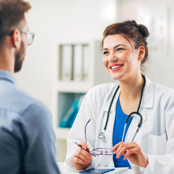 Healthcare professional talking with patient