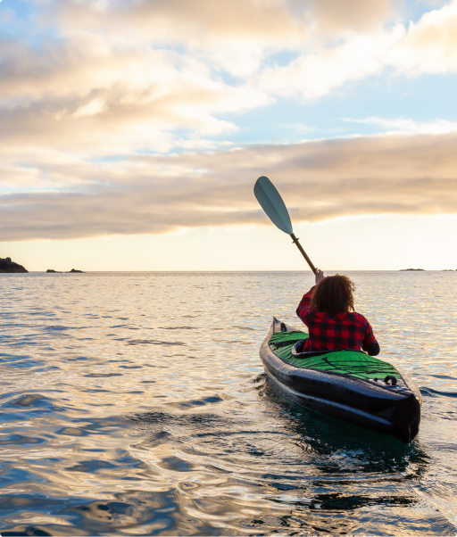 Young woman kayaking in Northern BC