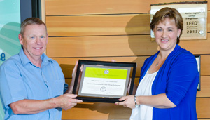 Murray Armstrong and Laurie Rancourt with the
LEED certificate.