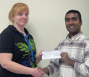 Nakib Ahmed, NLC Financial Aid officer (right), with Paul Dampier Career and College Prep Entrance Award recipient Agnes Bueckert.