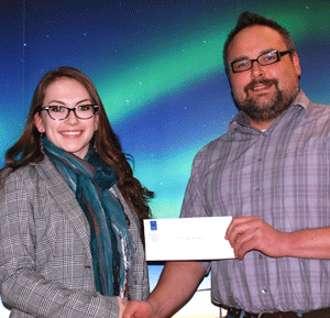 Tara Good received four awards including the
Devon Canada Corporation Aboriginal Award
presented David Christie, Aboriginal Student
Advisor at the Fort St. John Campus.