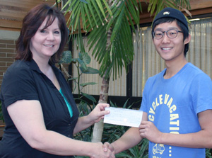 Hyunki Lee receiving the NLC Foundation
Entrance Award from Fort St. John Campus
Administrator Kathy Handley.