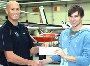 Jonathan Ring received the Erich W. Lehmann
Memorial Award from AME program chair Hal Hobenshield.

