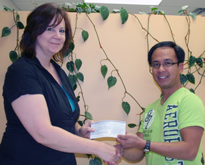 Ronald Rapio receiving the NLC Foundation
Entrance Award from Fort St. John Campus
Administrator Kathy Handley.