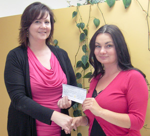 Alicia Remenda-Alton receiving the Audrey
Clark Memorial Award from Fort St. John
Campus Administrator Kathy Handley.